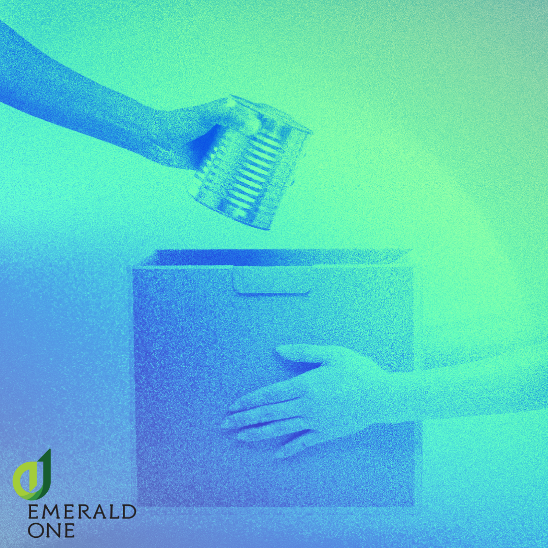 image of a person placing a can in a food drive box